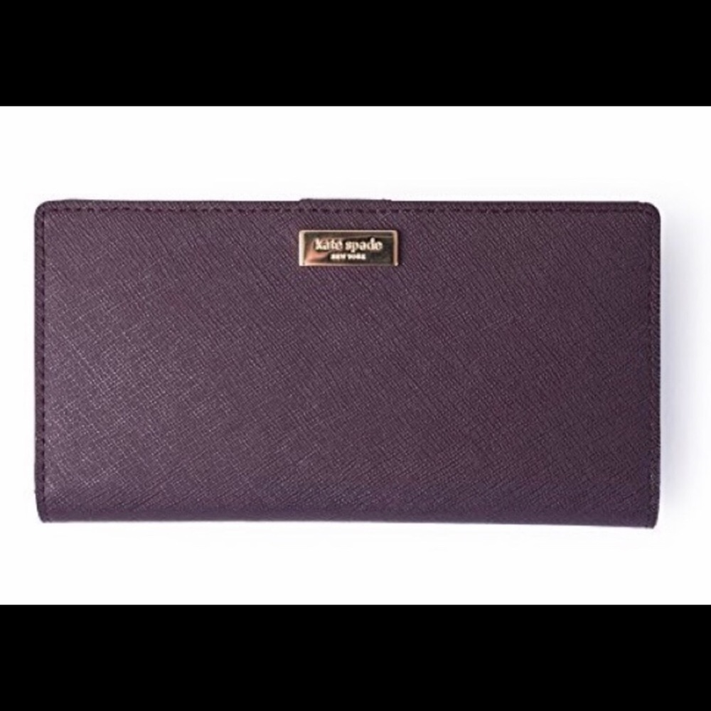 Purple Kate Spade wallet. In great condition